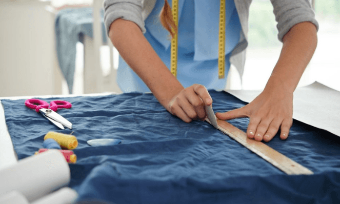 Sialkot custom apparel manufacturing factory floor